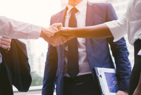 Business handshake | Scott Legal, P.C. Business man and woman shaking hands