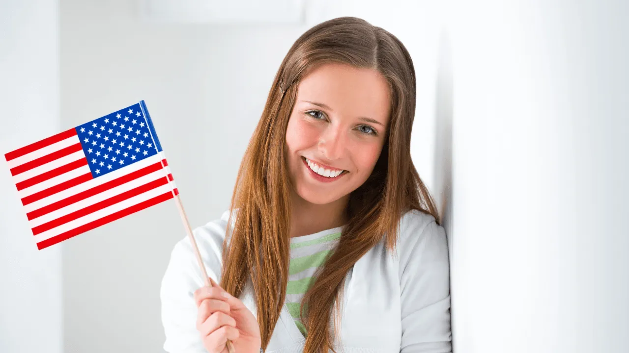 Woman holding American flag
