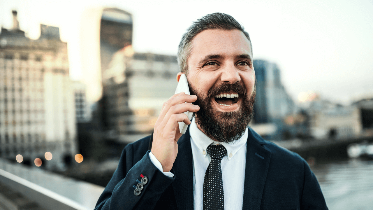 Smiling man on phone