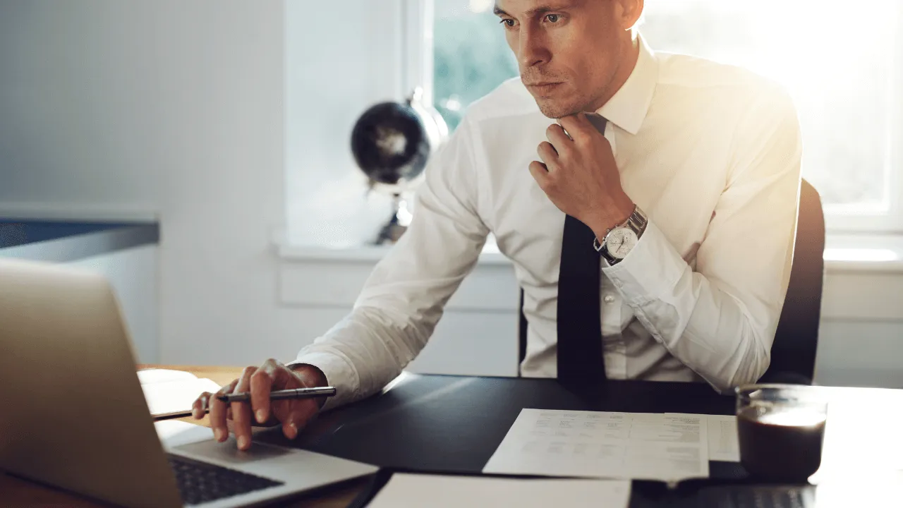A Paralegal working on his laptop