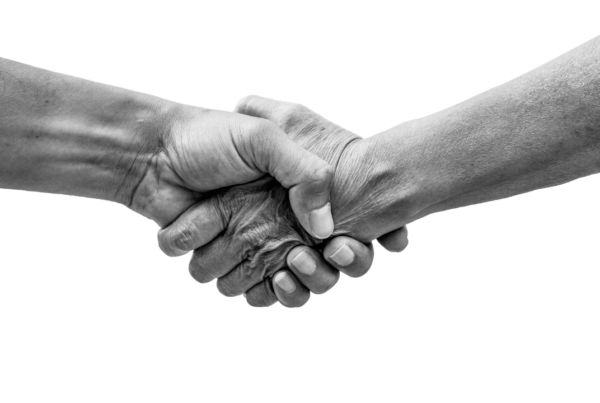 two hands meeting in the middle