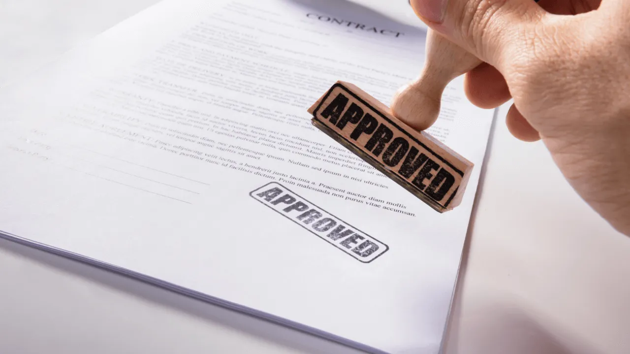 Approved stamp on paper
