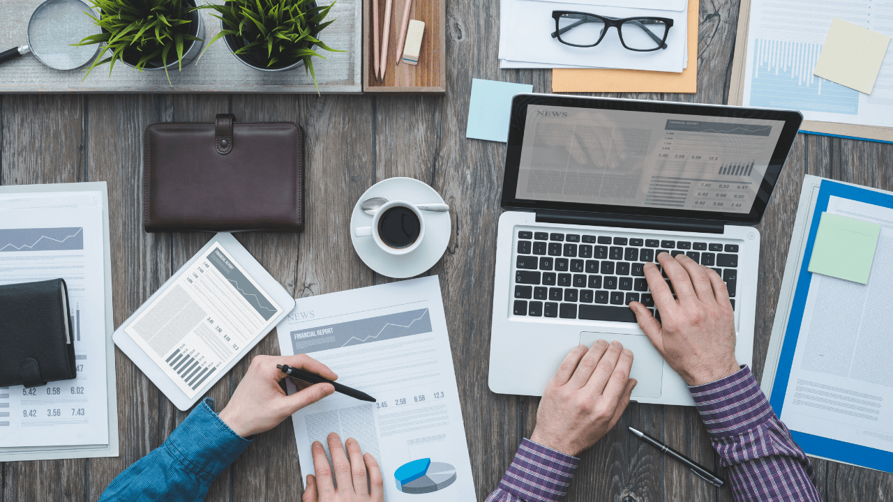 man working on laptop on desk