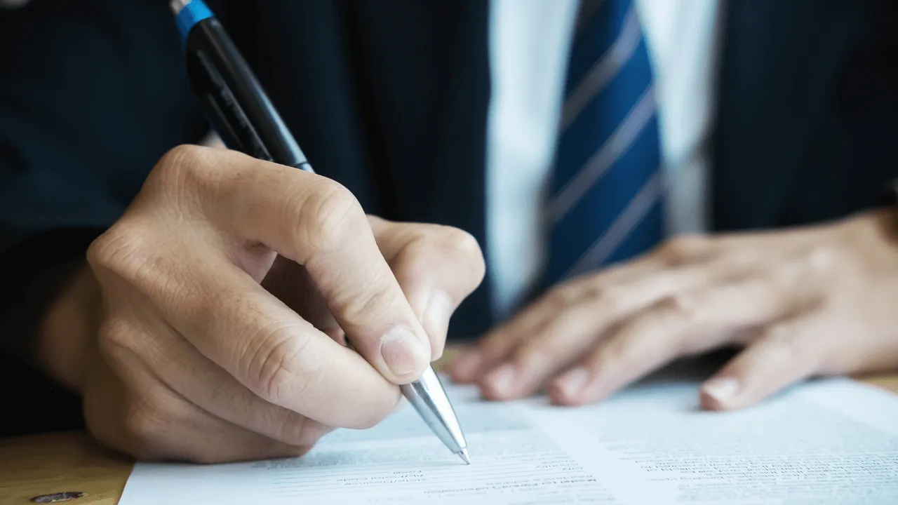 Business man writing document