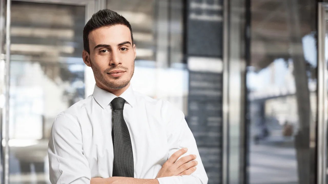 Business man standing in his office
