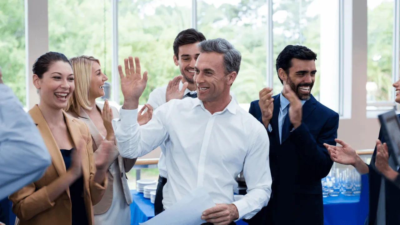Office team celebrating a win