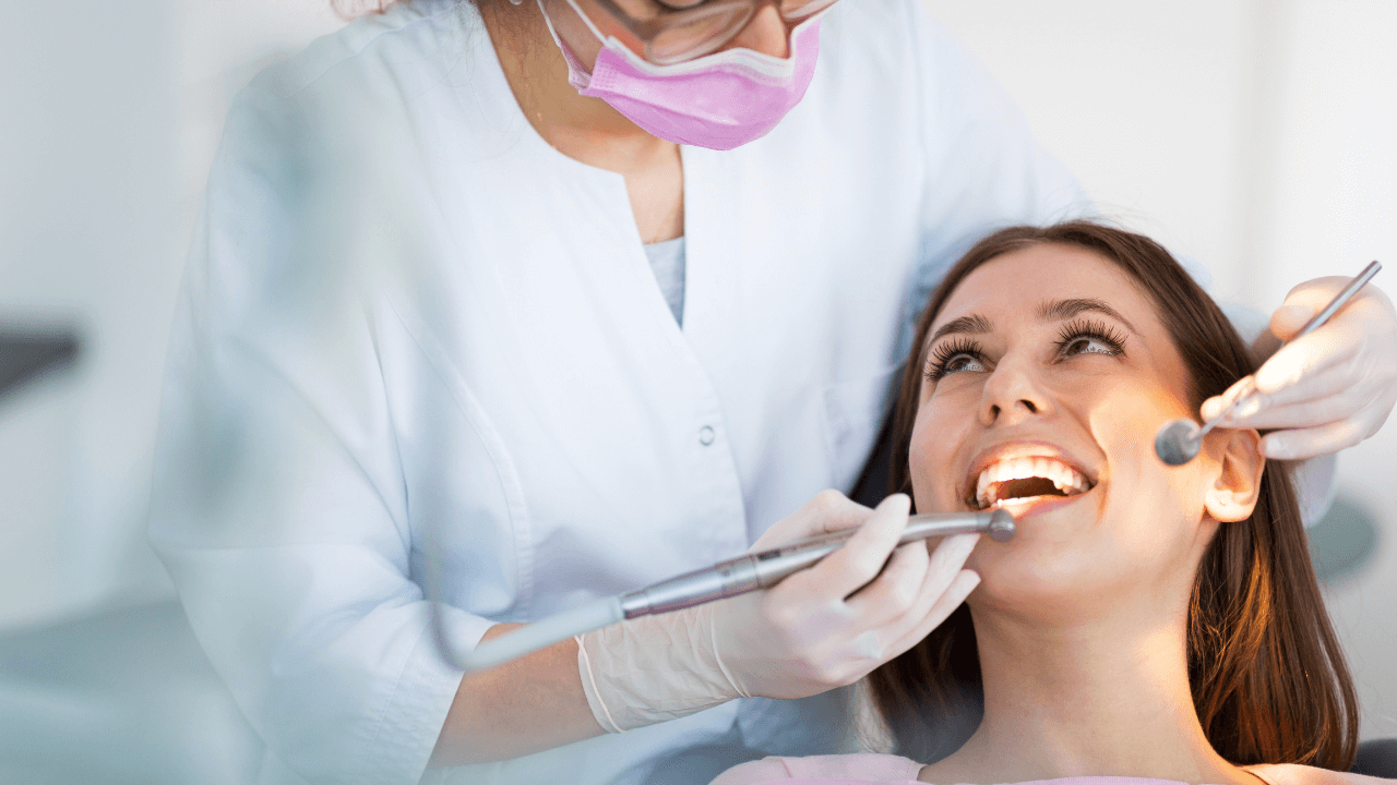 woman sitting in dentist chair