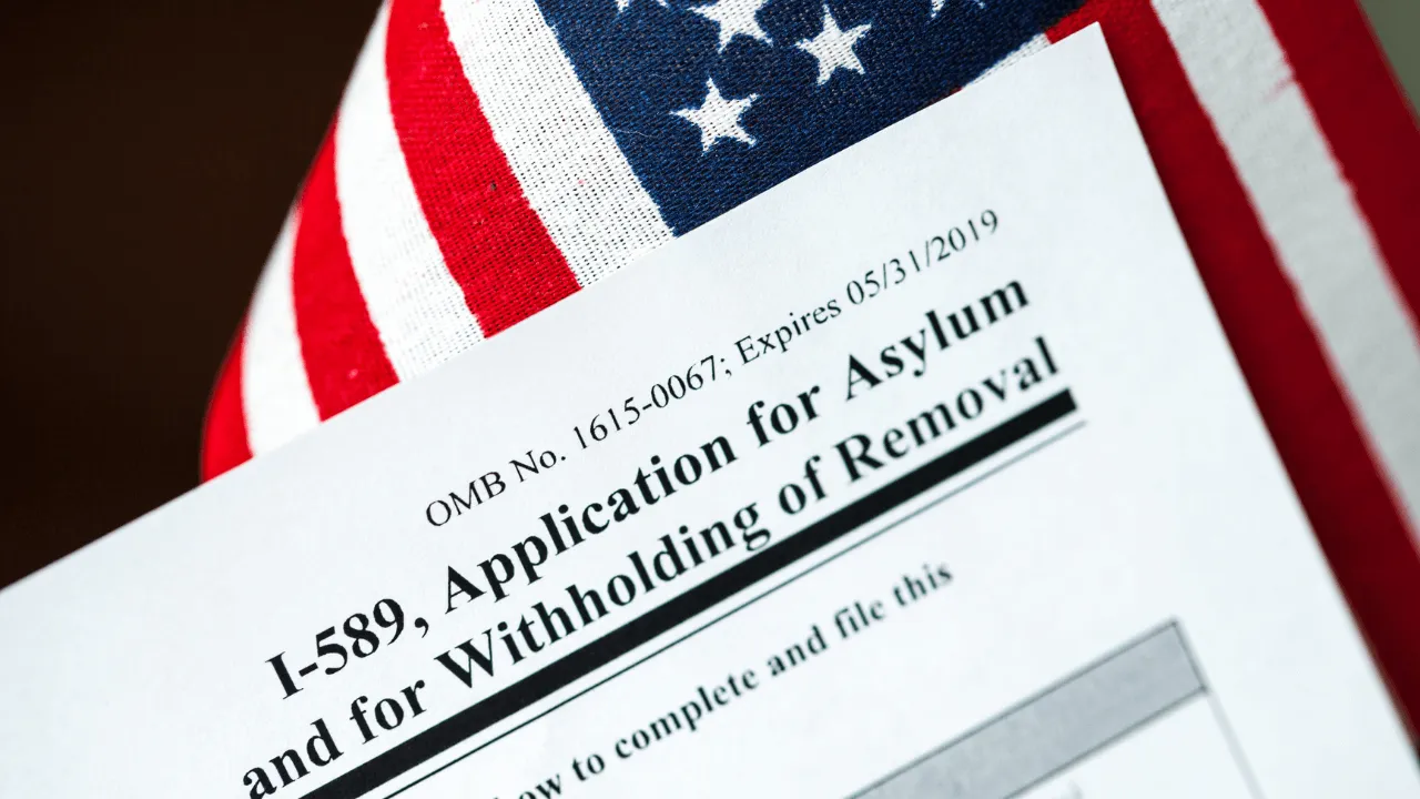 form I-589 Application for asylum with USA flag