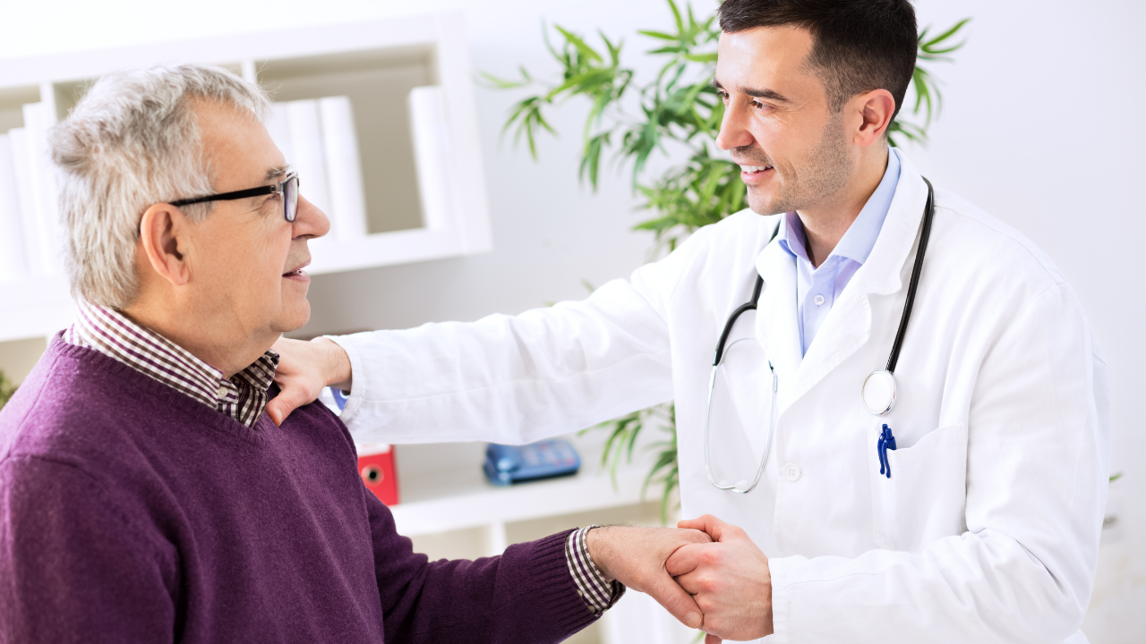 A doctor speaking with one of their patients