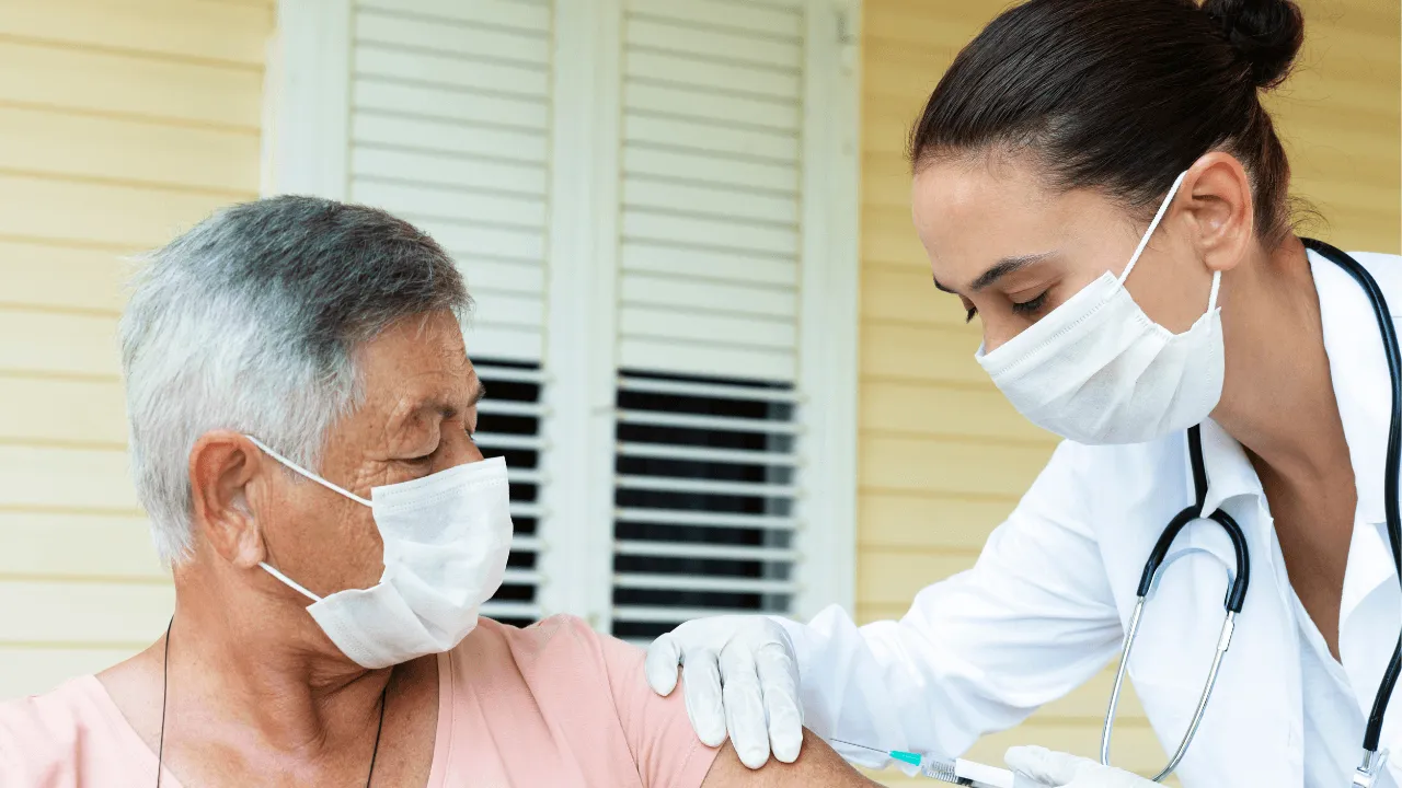 a doctor administering a vaccine
