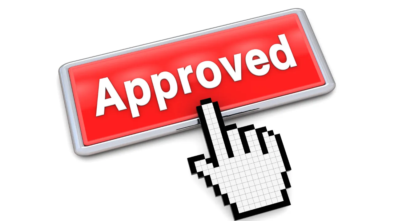 An approved i con being clicked on a computer