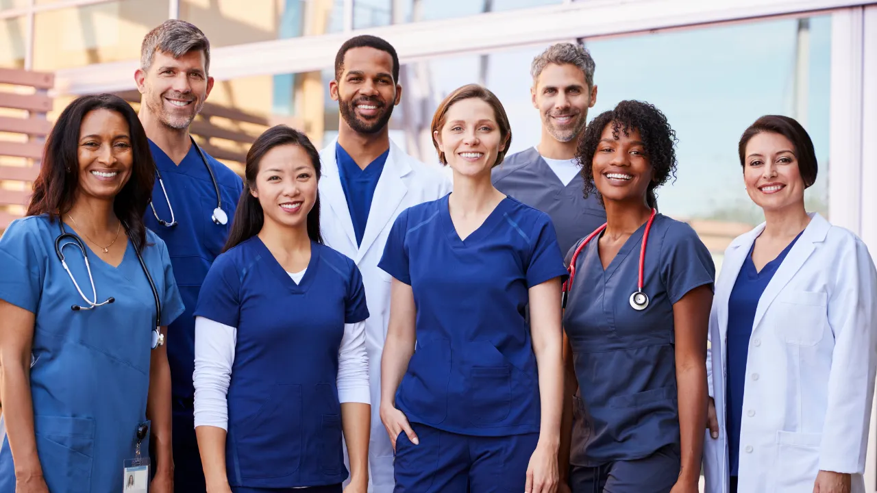 A group of nurses smiling