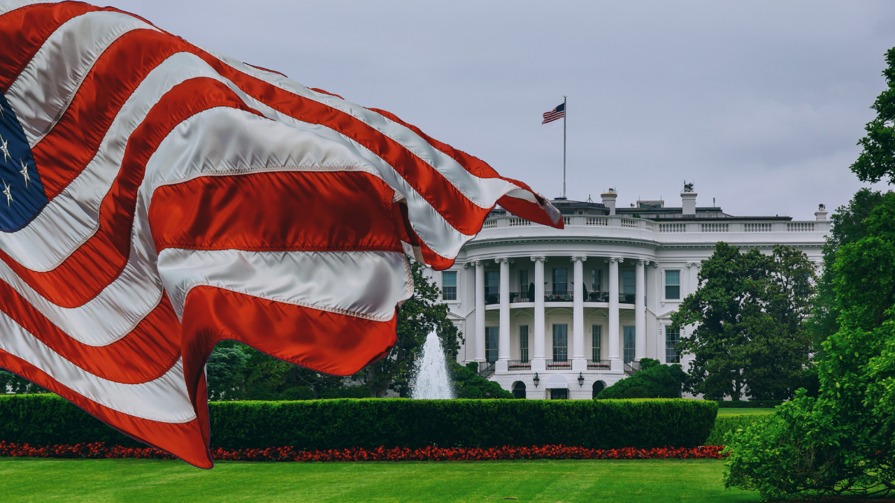 The US flag and white house