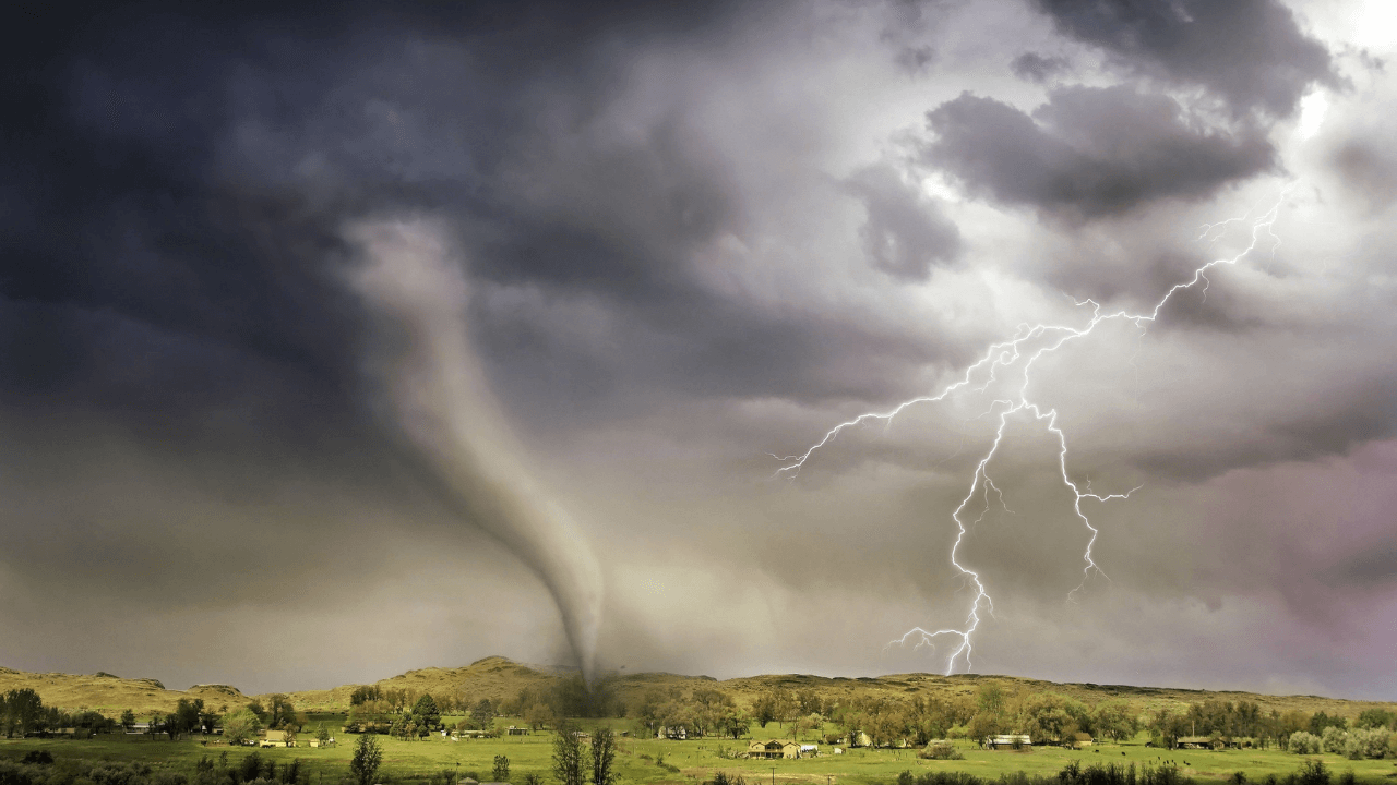 A tornado passing over farm land