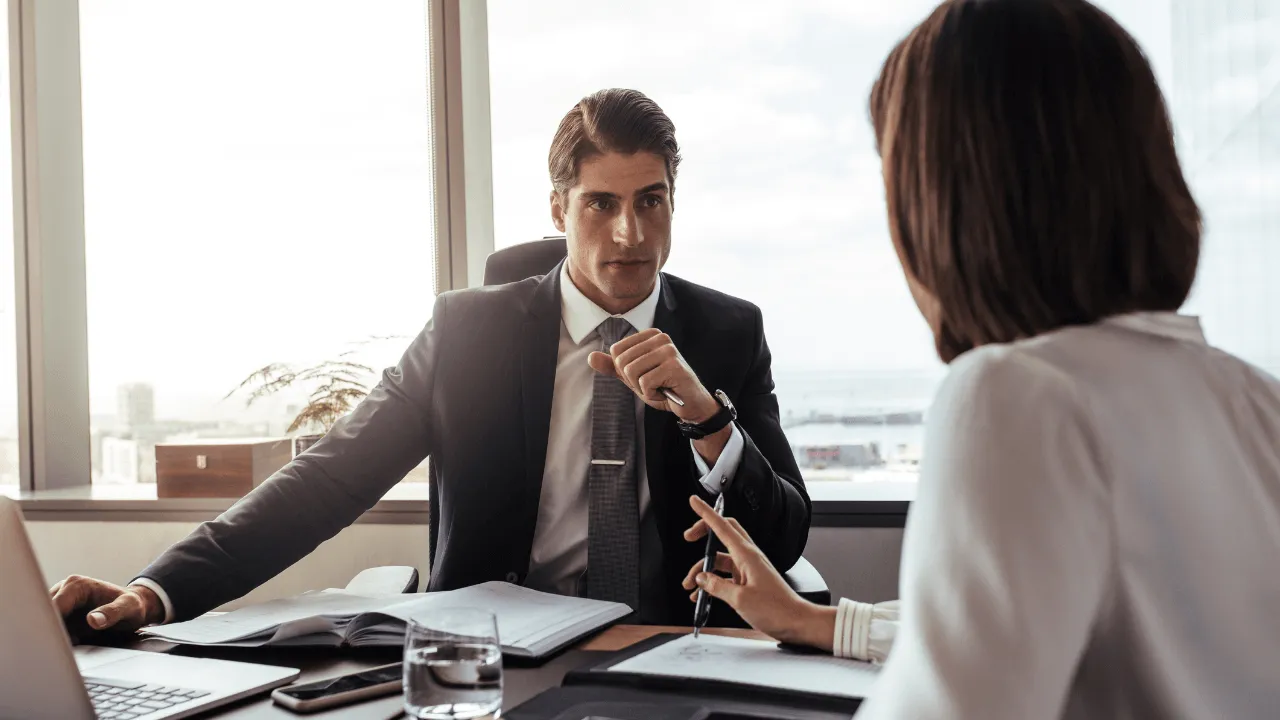 Two attorneys speaking with each other