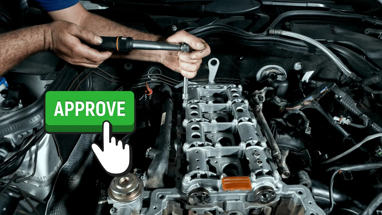 An "approve" button next to a man repairing a car