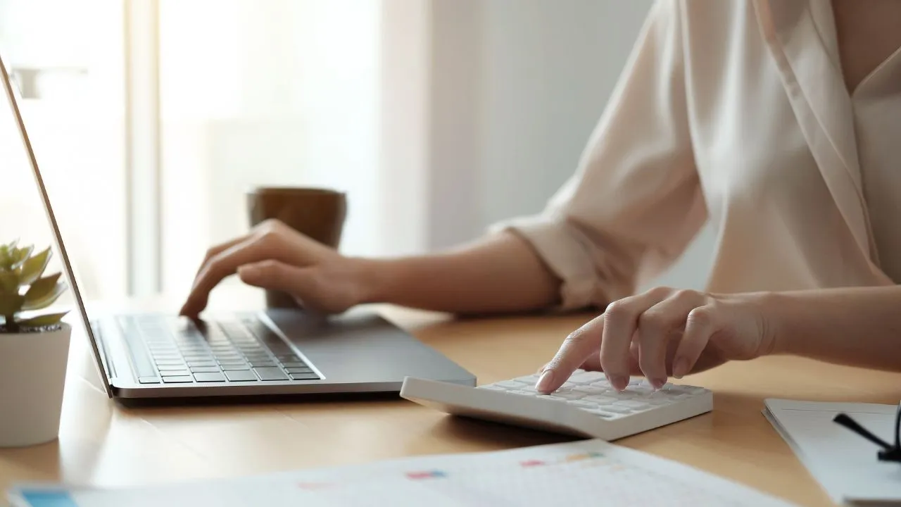 A business woman looking at her business account