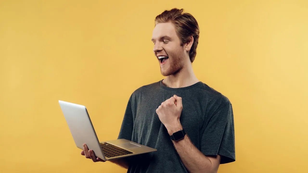 Man celebrating his recent approval