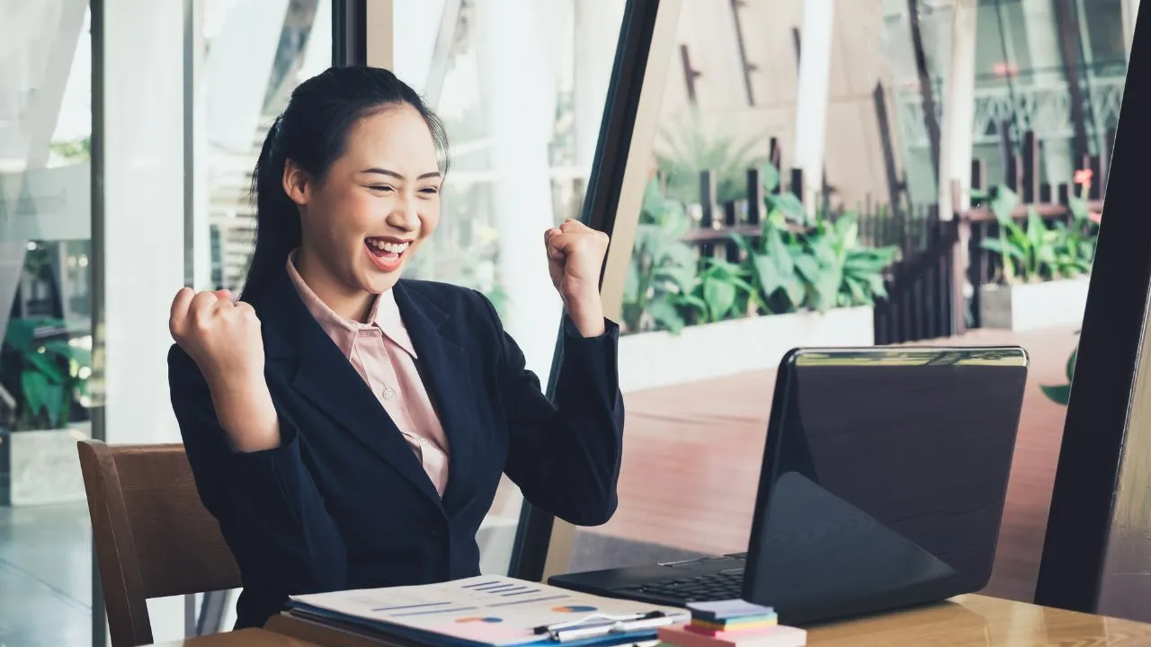 A woman celebrating a win