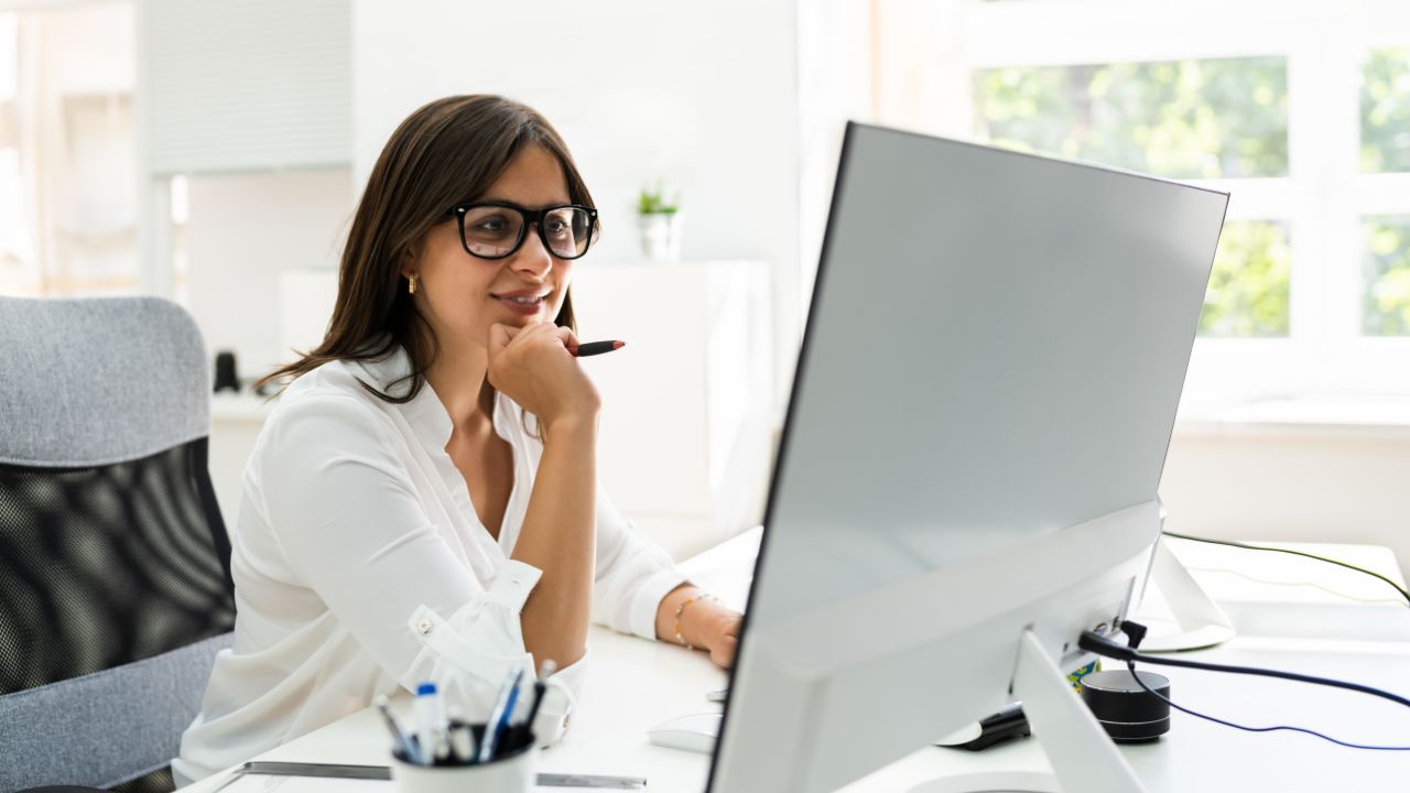 An executive working in her office on her computer