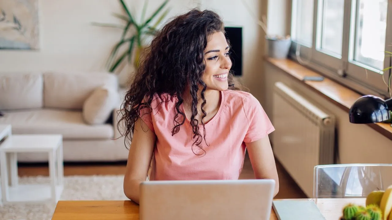 A woman working in her office on her laptop