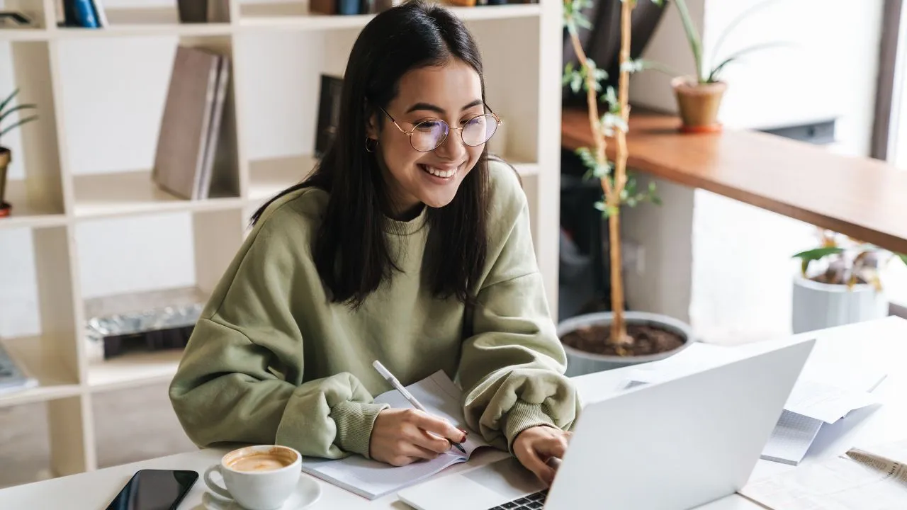 A student working on her laptop