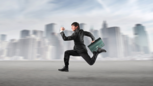 A business man running extremely quickly