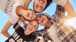 A group of teenagers enjoying themselves together