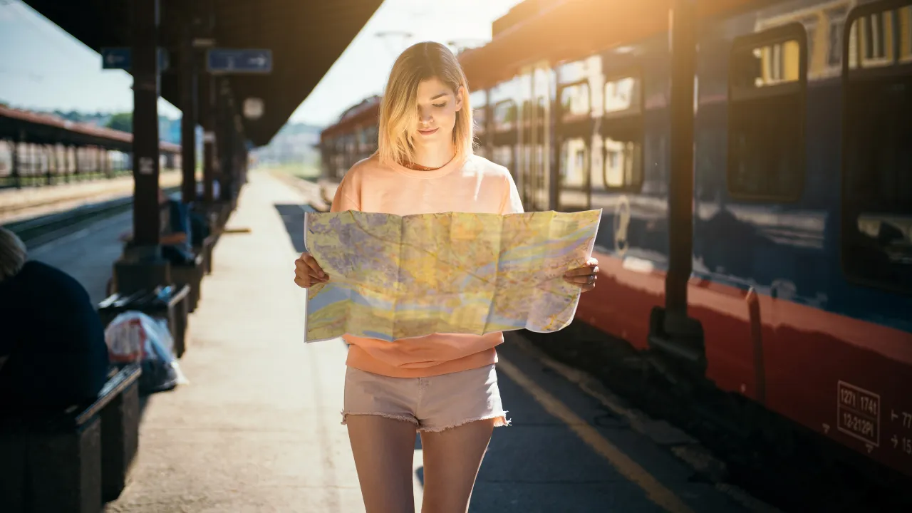 A woman looking at a map