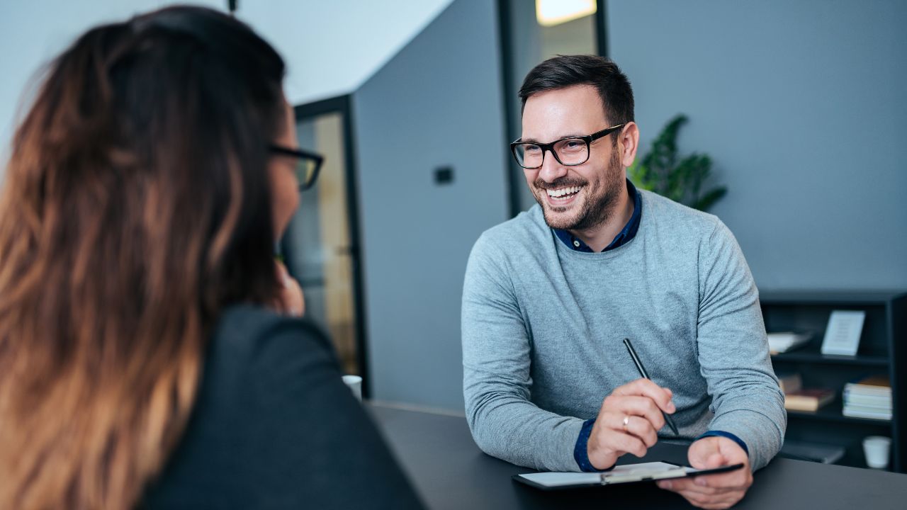 Two people sitting in an interview