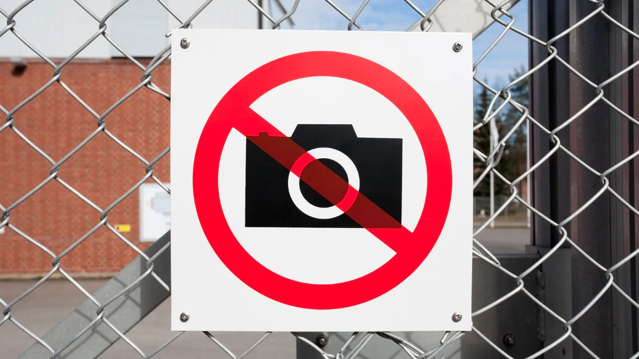 no photos depicted on a fence