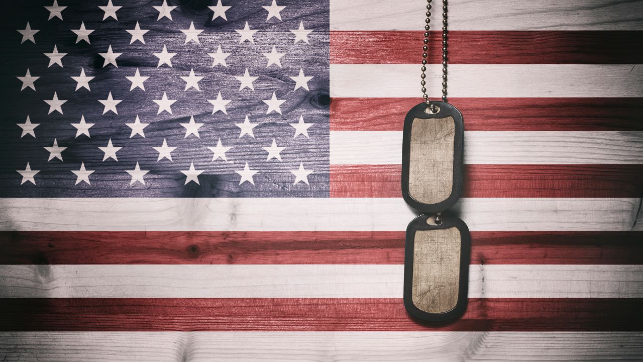 A US flag and military tags