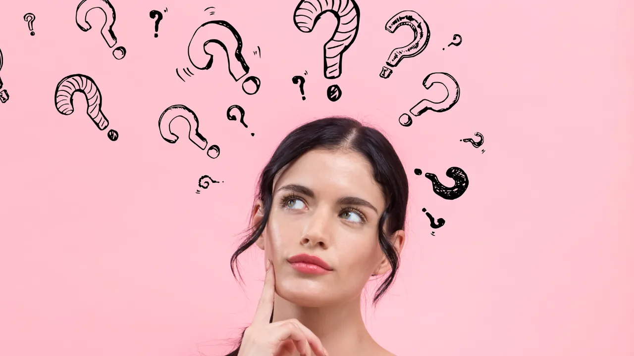 A woman wondering what the answer to her question is