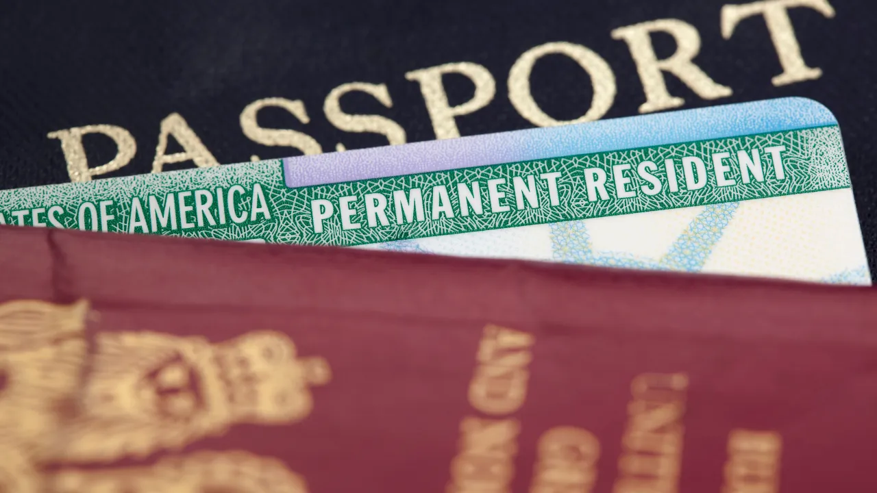 a passport and green card