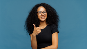 A woman doing thumbs up