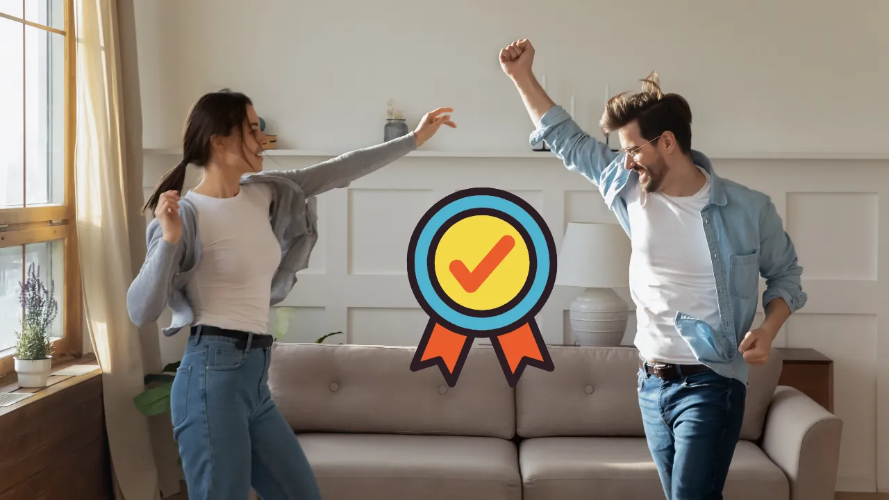 A couple celebrating a recent E-2 approval