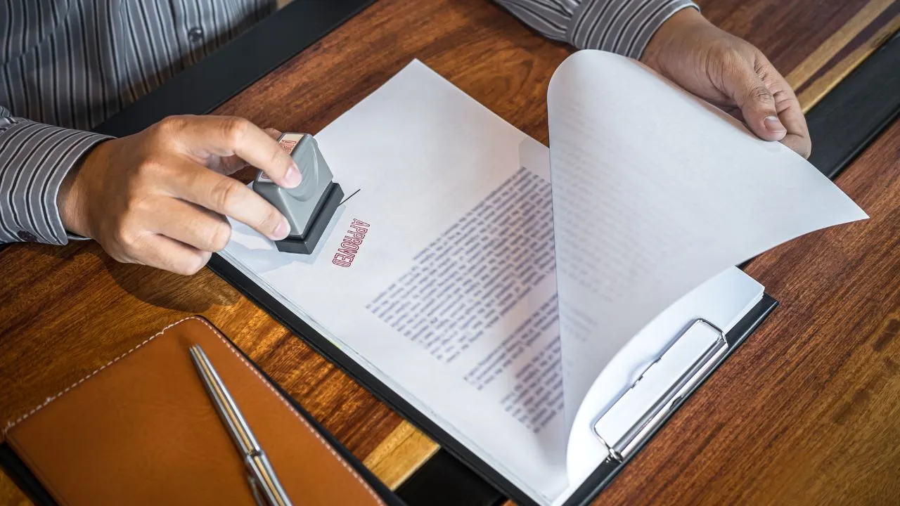 approved stamp on a piece of paper