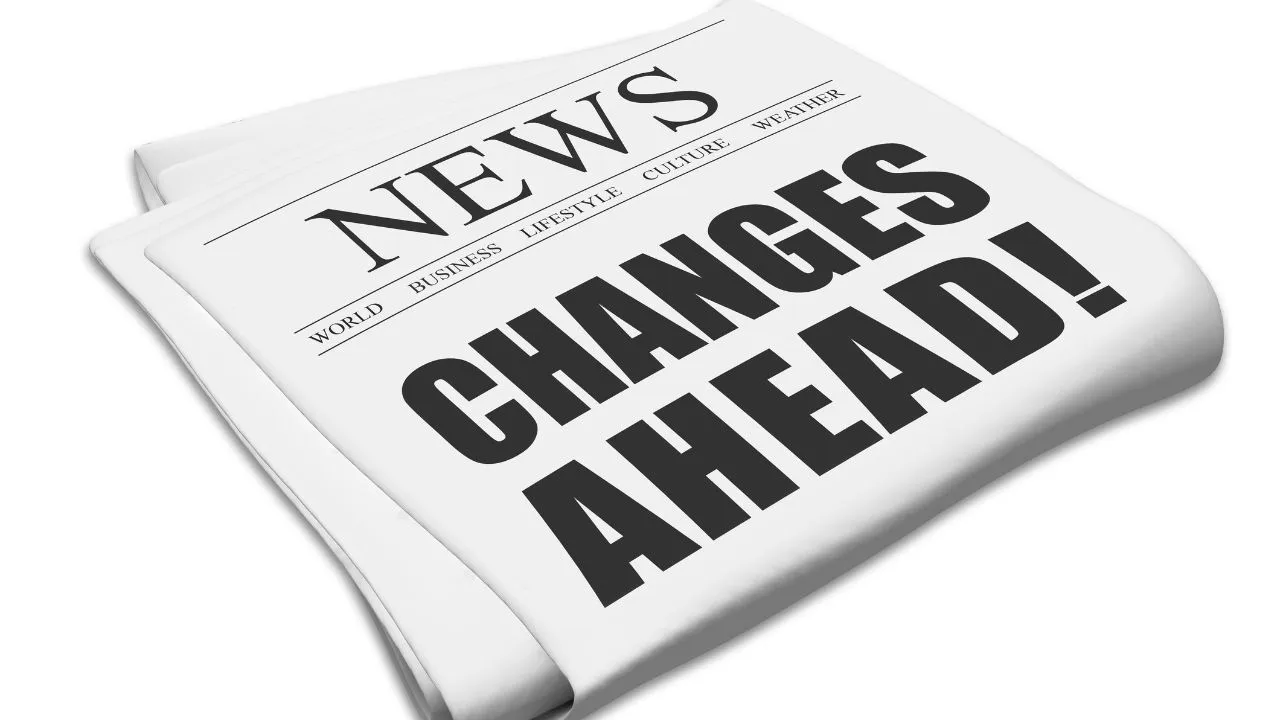 A Newspaper with a headline "changes ahead"