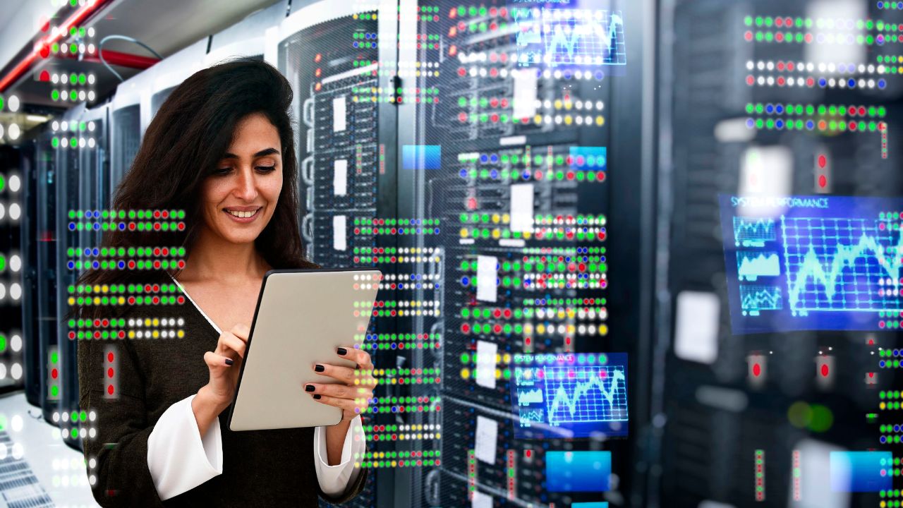 A woman working in an IT room