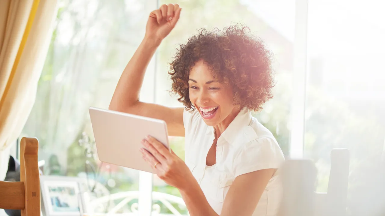 A woman celebrating a win