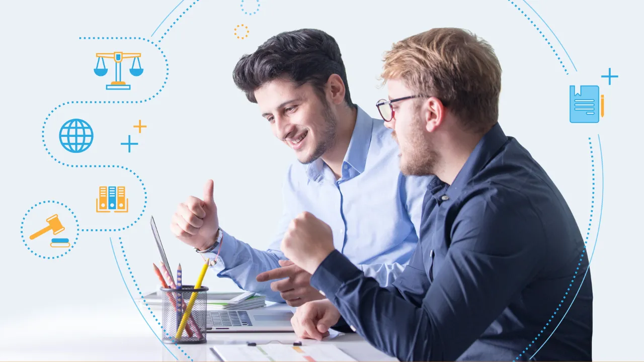 Two business men working at a desk