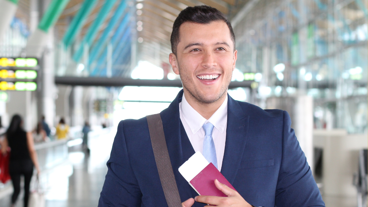 A happy business man arriving at the airport