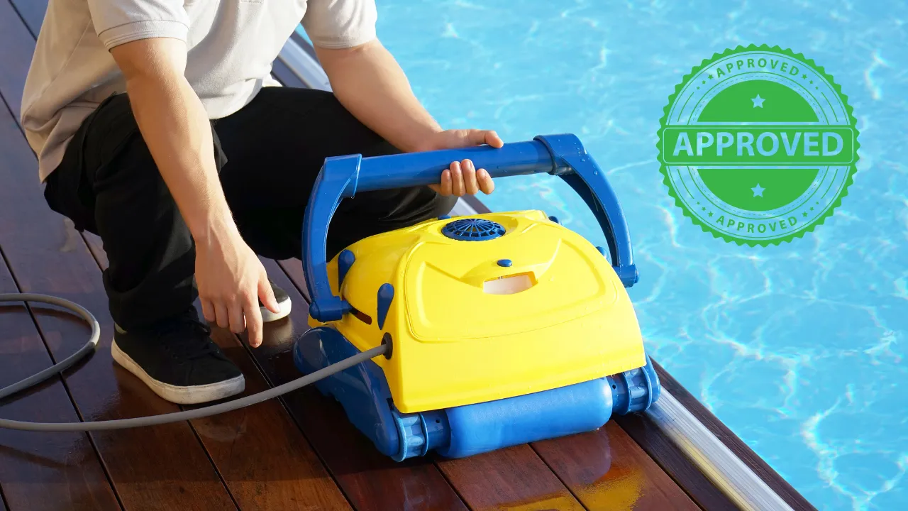 A ppool cleaner next to a clean pool
