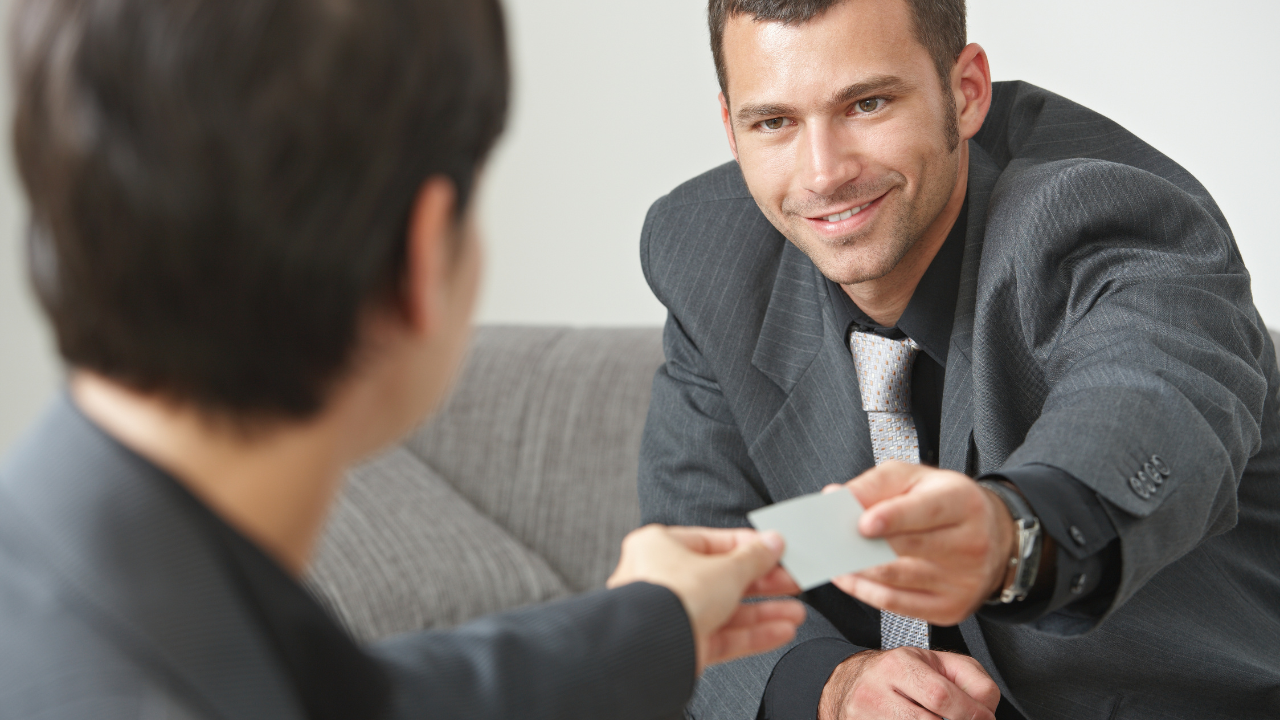 A lawyer helping a client with a change of status