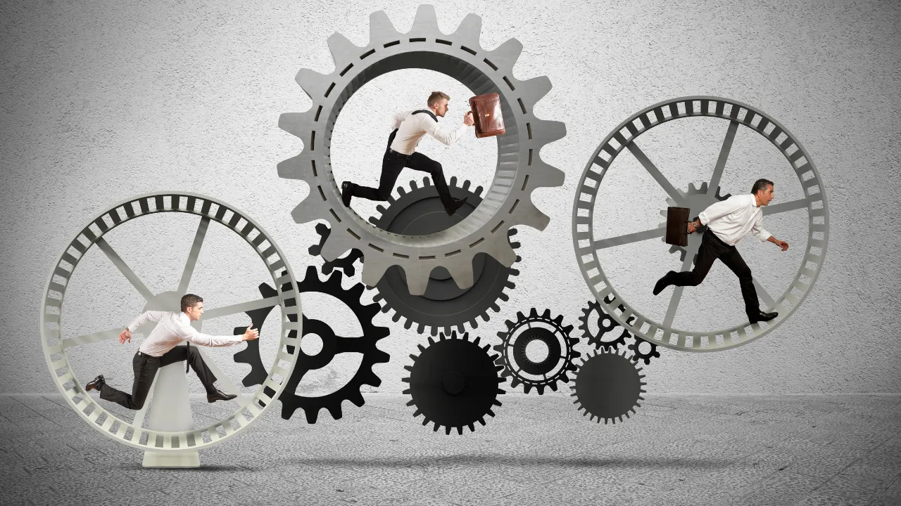 A man running through some gears in a suit