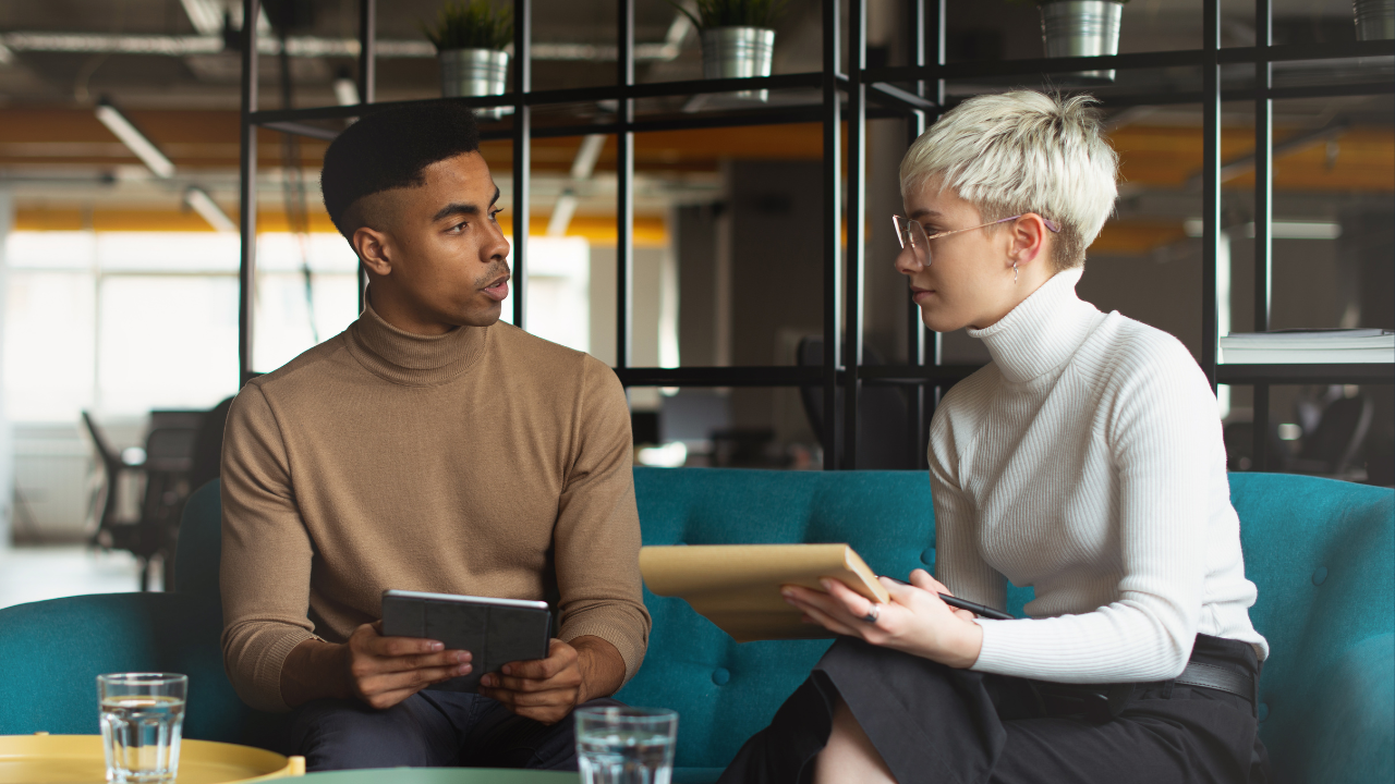 Two employers or employees having a discussion