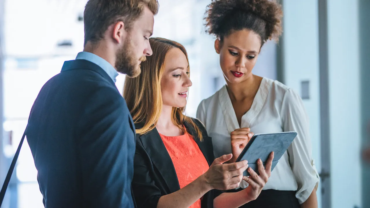 Two people going over their immigration options with an attorney
