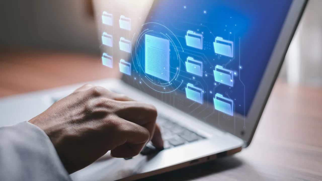 A man submitting an application online