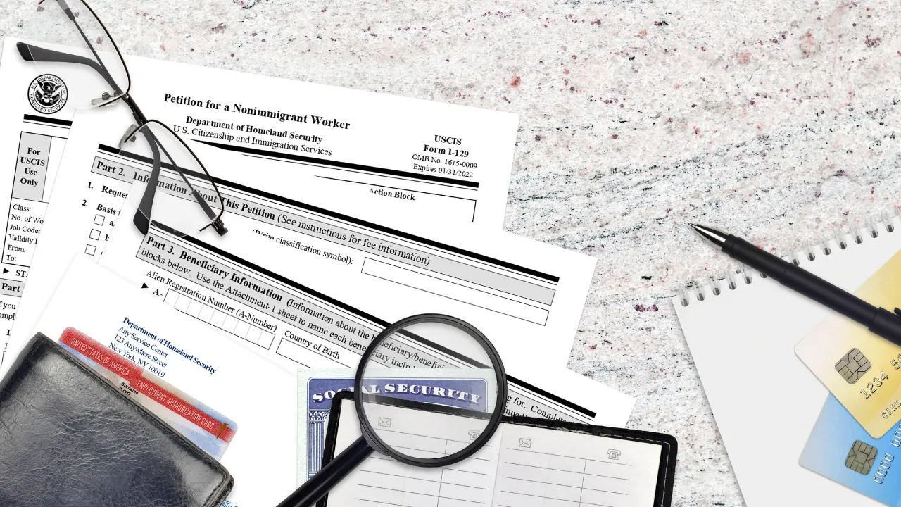An I-129 form on a desk