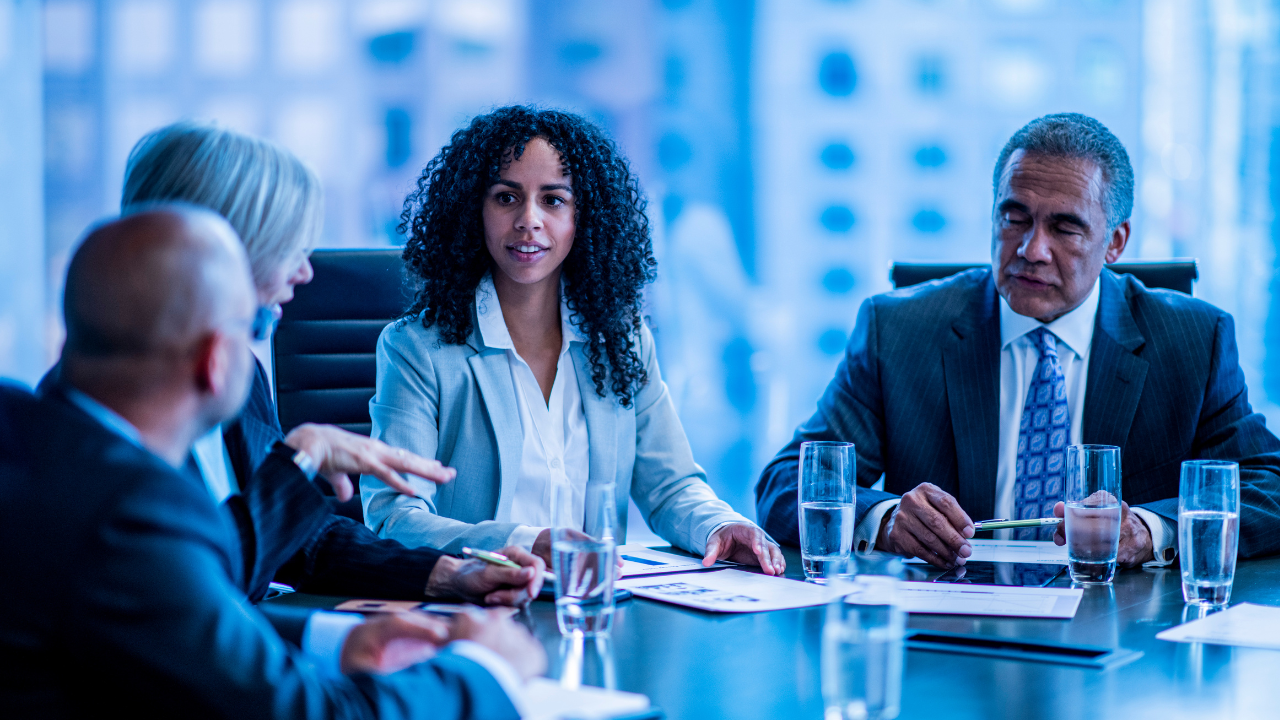 A group of executives in a board meeting